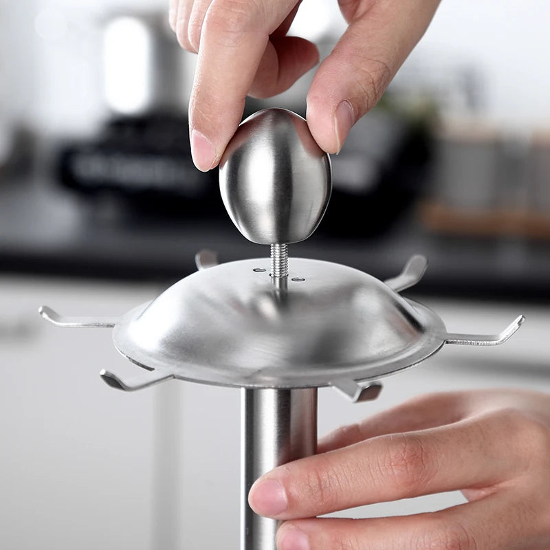 Soporte organizador para utensilios de cocina de acero inoxidable con carrusel giratorio de 360 grados y 6 ganchos.