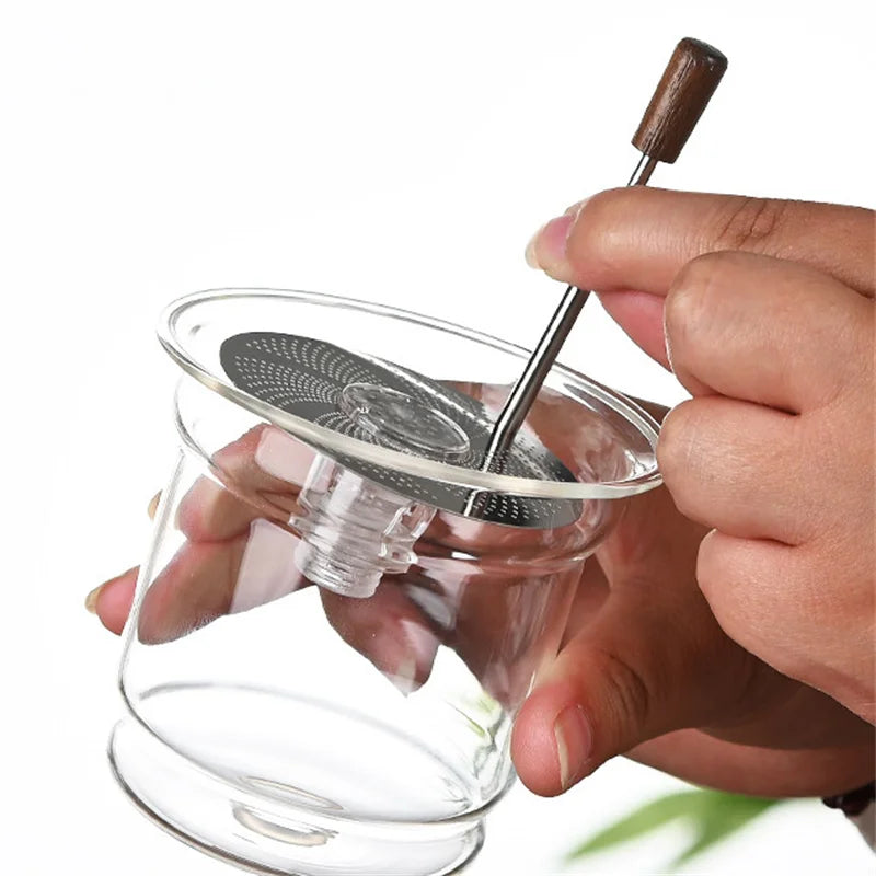 Tetera de vidrio con filtro y mango de madera para separar el té con un solo clic, recipiente interior con infusor y filtro.