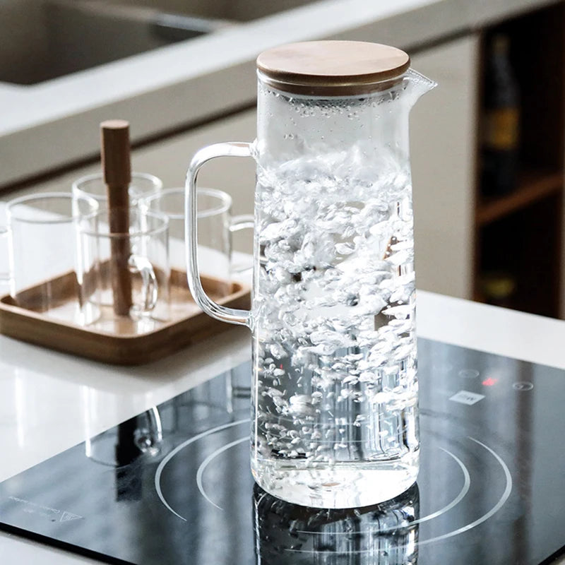Botella de agua de vidrio espesado de 1000 ml con tapa de bambú, jarra de jugo a prueba de explosiones de vidrio espesado Gaopeng.
