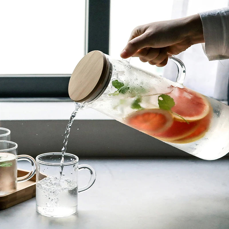 Botella de agua de vidrio espesado de 1000 ml con tapa de bambú, jarra de jugo a prueba de explosiones de vidrio espesado Gaopeng.